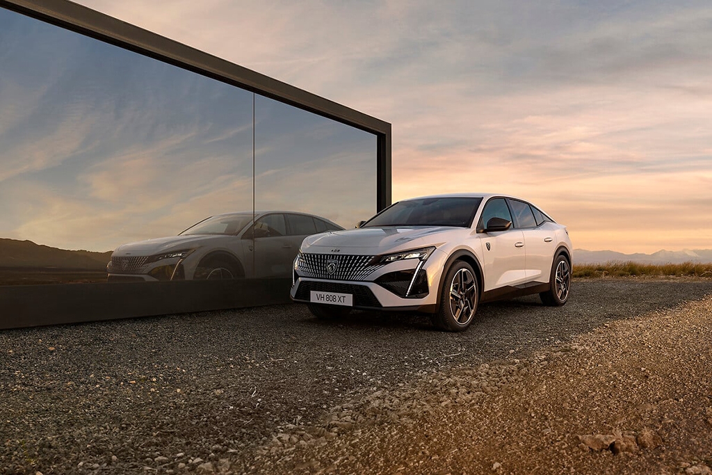Peugeot unveils new electric E-408