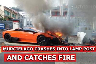 Lamborghini catches fire after crashing into lamp post