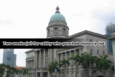 Two weeks jail term for cabby who punched motorcyclist