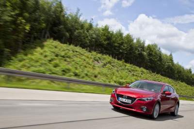 Convoy of all new Mazda3 cars to drive from Japan to Germany