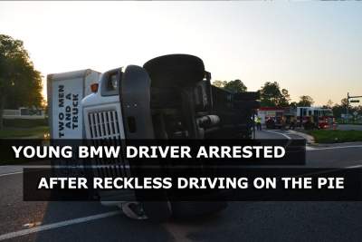 BMW driver arrested after colliding with lorry and causing serious injuries