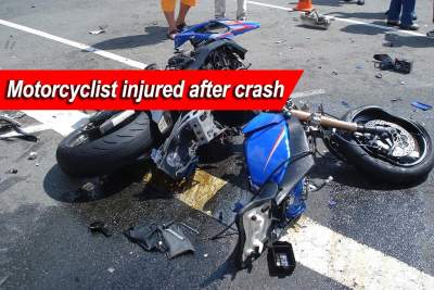 Biker hurt in accident with trailer