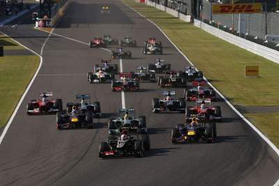 Vettel denies Webber and Grosjean victory in Suzuka