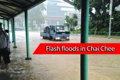 Vehicles stranded in flash floods in Chai Chee