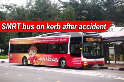 Accident with car causes bus to go over kerb