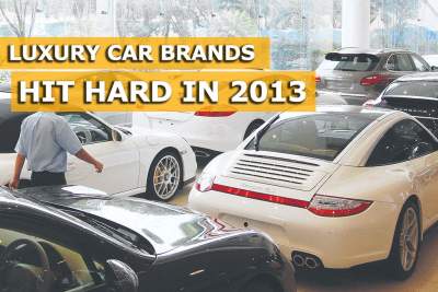 Luxury car sales tumble in second half of 2013