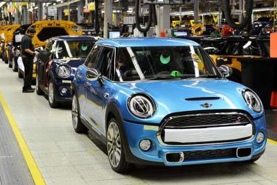 The new MINI five-door hatch rolls off production lines at Oxford
