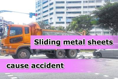 Sliding metal sheets from a trailer cause accident