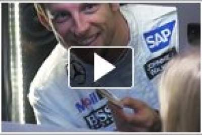 Jenson Button plays secret Santa to ATM customers