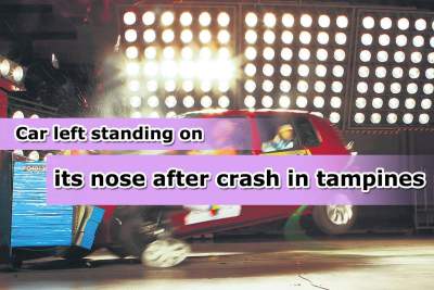 Car stands on its nose after it crashes