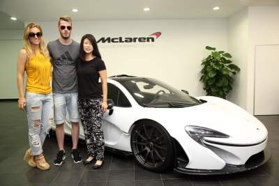 Professional goalkeeper David de Gea checks out the McLaren P1 in Singapore
