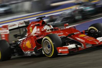 Vettel sets blistering pace to take Singapore GP pole position
