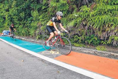 Two dedicated lanes on Bencoolen Street for pedestrians and cyclists