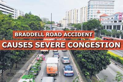 Traffic congestion along Braddell Road after car mounts centre divider
