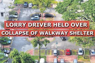 Lorry driver held over collapse of walkway shelter