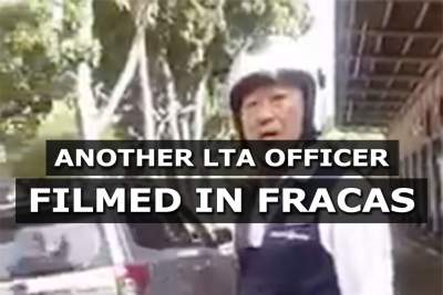 Another LTA officer caught on camera yanking open door of a car
