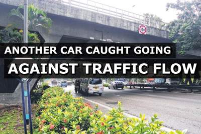 Yet another car caught on camera going against flow of traffic