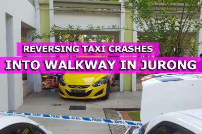 Reversing taxi crashes into walkway between two blocks at Jurong West Street 81