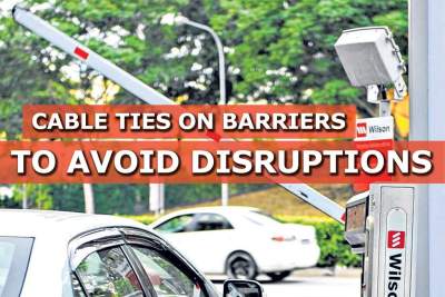 Cable ties used on barriers 'to avoid disrupting parking system'