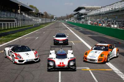 Porsche presents performance hybrid models at Monza summit
