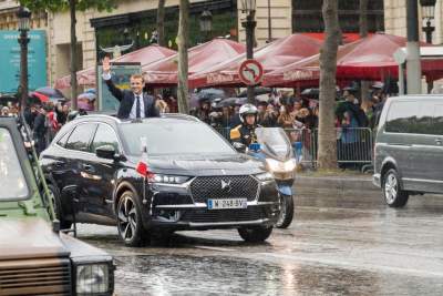 French President Emmanual Macron rides in the all new DS 7 Crossback