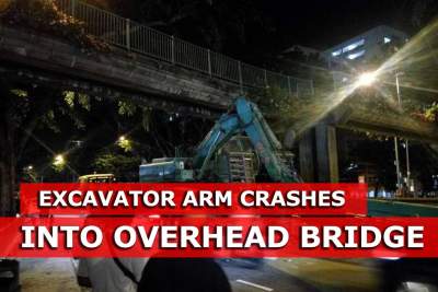 Excavator arm crashes into overhead bridge along Balestier Road