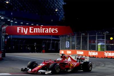 Vettel shocks Red Bulls to take Singapore GP pole