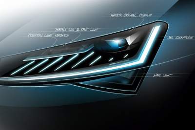Skoda showcases full LED head lights on new Superb