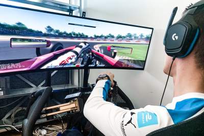 BMW's race drivers compete against professional sim racers