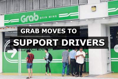 Grab cuts costs in bid to support drivers