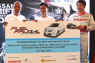 Nissan drivers race against Nissan race car driver in fuel efficiency drive