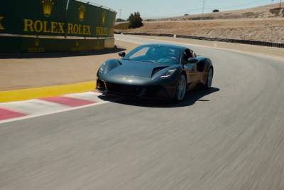 Jenson Button takes the Lotus Emira out at Laguna Seca circuit