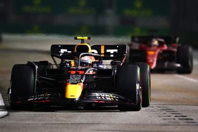 Sergio Perez holds off Charles Leclerc to win a wet and eventful 2022 Singapore GP