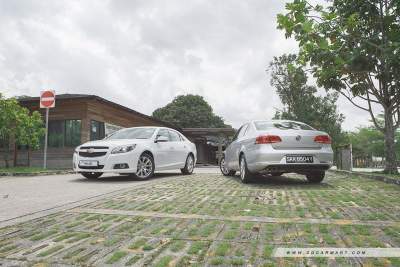 Chevrolet Malibu 2.4 LTZ (A) vs Volkswagen Passat 1.8 TSI DSG (A)
