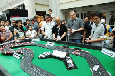 Racing electric-powered Porsches