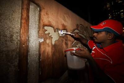 Caltex gets graffiti on public wall