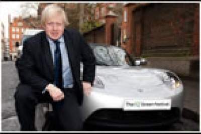 Boris Johnson gets into the Tesla Roadster