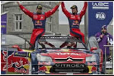 Loeb takes chequered flag in Ireland WRC