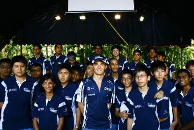 F1 driver shares success with Singapore youths