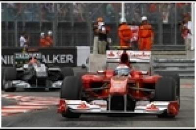 Schumacher given penalty for overtaking move