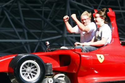 Boy who rescued 6 children from a house fire gets a visit to Ferrari World