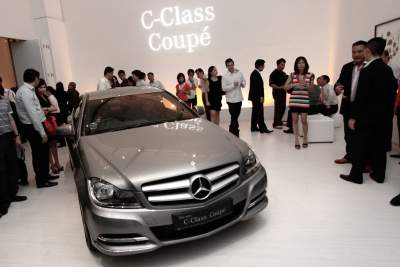 Mercedes Benz launches the C-Class Coupe and the SLK Roadster