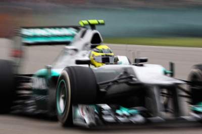 German driver Nico Rosberg storms to victory at Shanghai