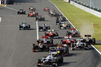Vettel claims victory in Japan while Alonso crashes out