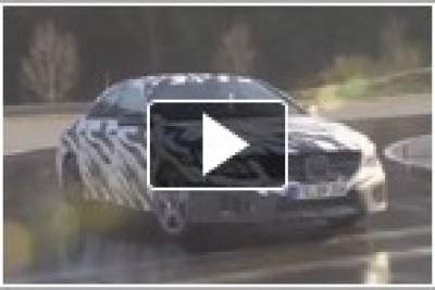 Mercedes teases camouflaged CLA - the smaller CLS coupe sedan