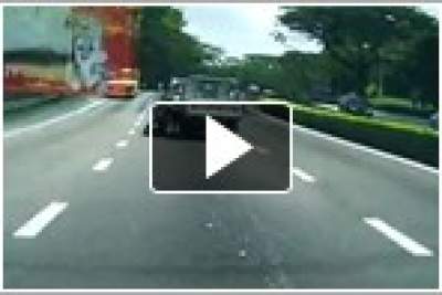 Overtaking lorry shot hitting woman motorcyclist, perhaps on purpose
