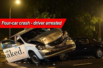 Driver involved in four-car crash arrested